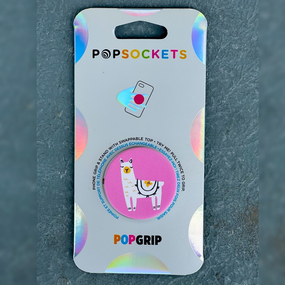 Phone grip and stand with Swappable top